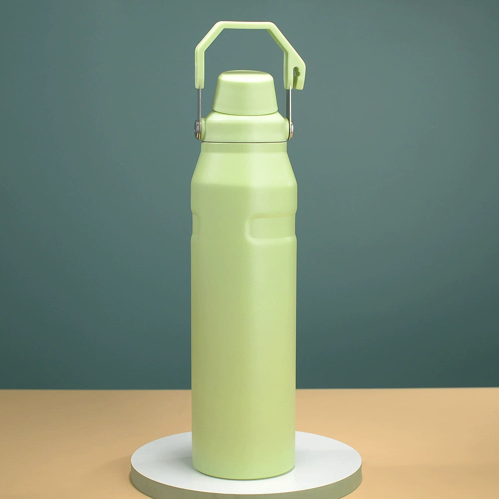 Green insulated bottle with carry handle for hot and cold drinks