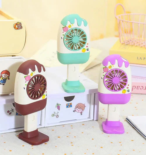 Cute mini rechargeable handheld desk fan in pastel colors with USB charging