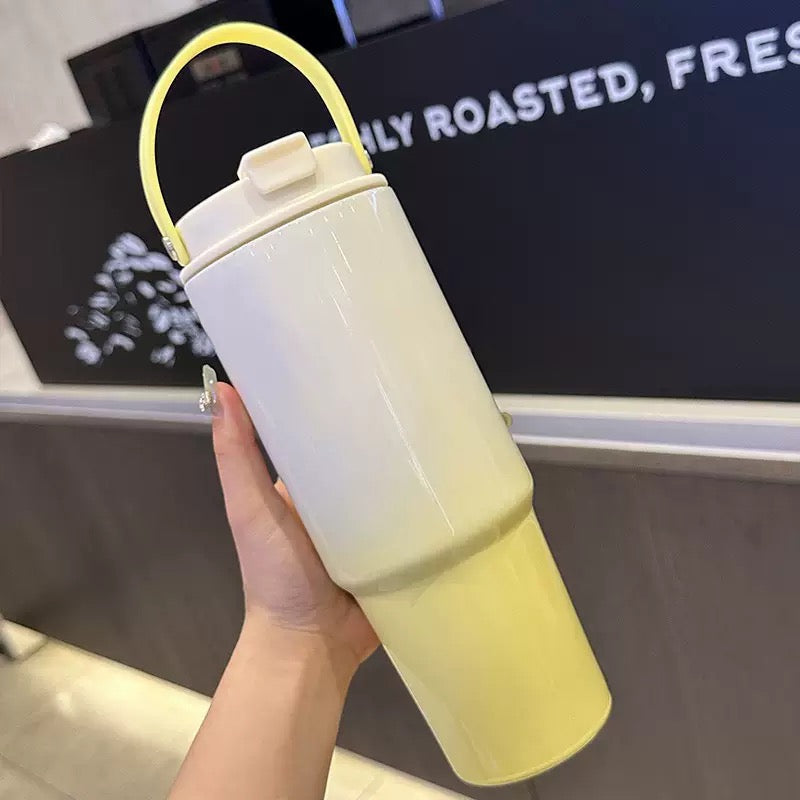 Hand holding yellow white gradient tumbler with flip lid — stylish gift for kids India