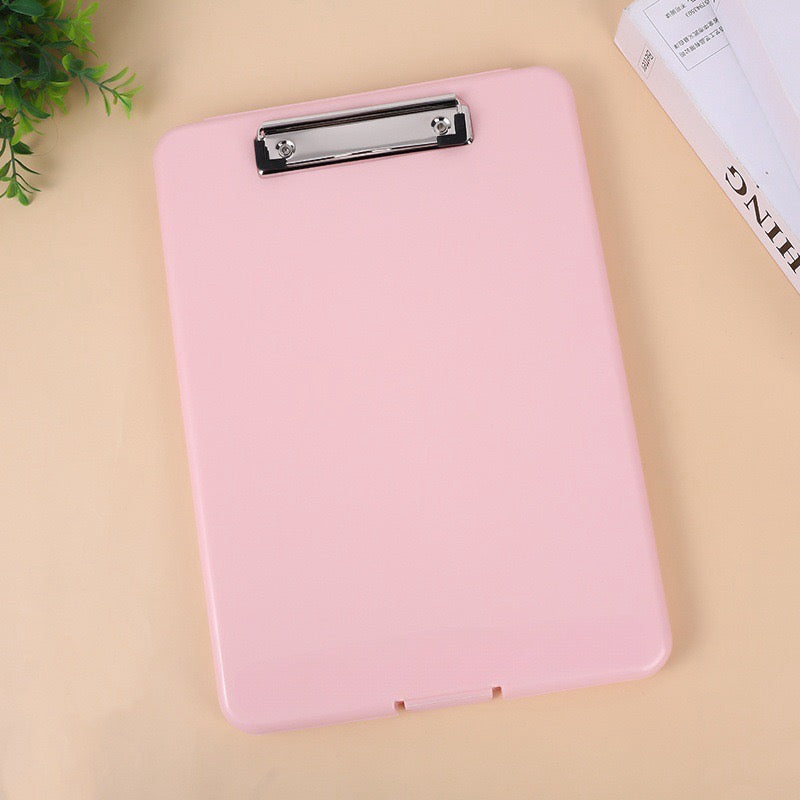 Pink clipboard with inner storage for documents and pens